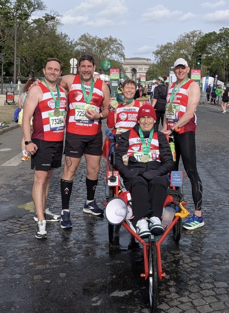 Gareth Rees and team with Paris Marathon medals