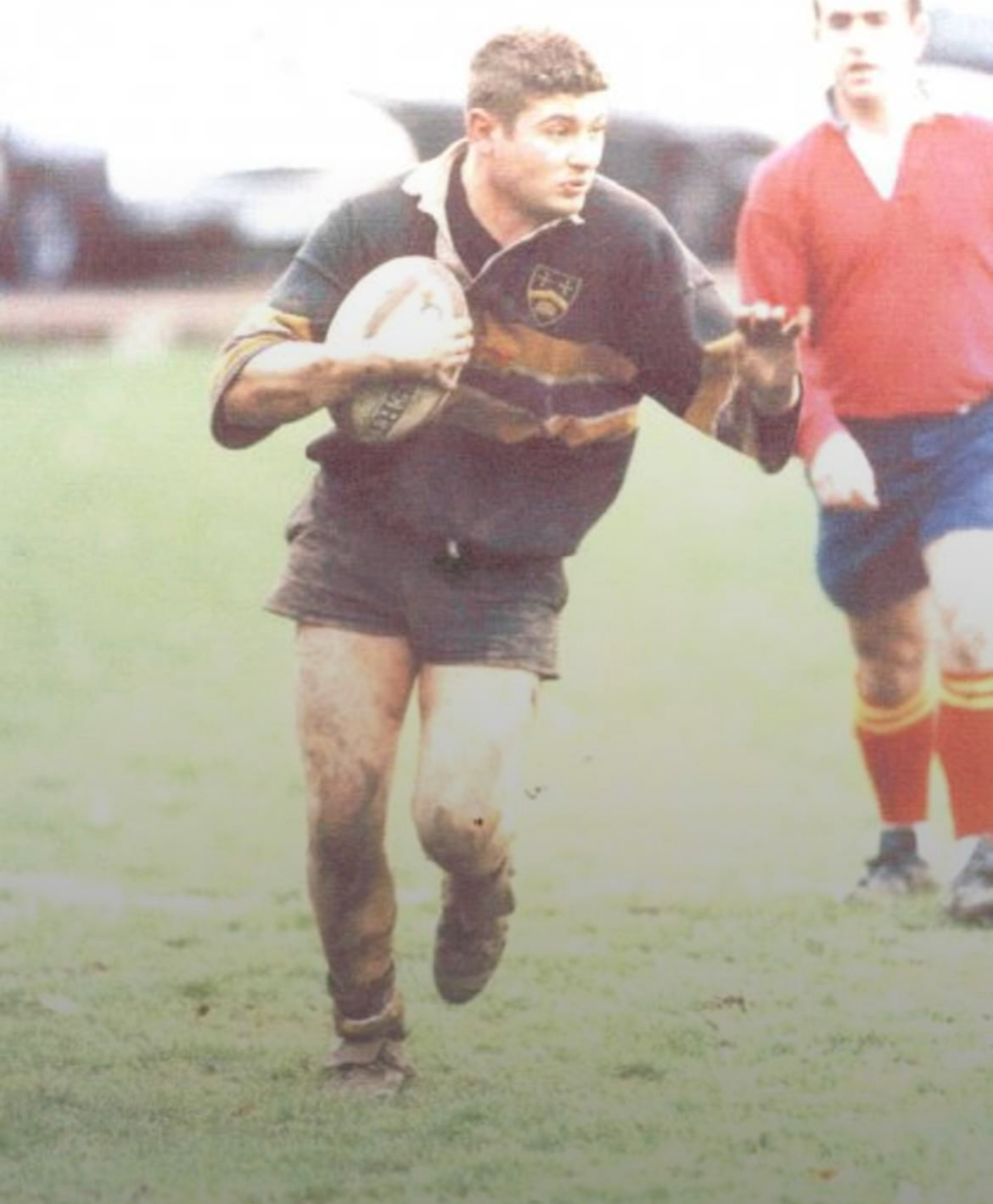 Barry Davids playing rugby